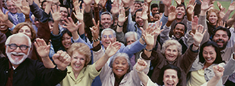 crowd of older audience cheering